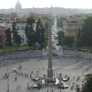 Obelisk in front of Santa Maria del Popolo Church in Rome, Italy